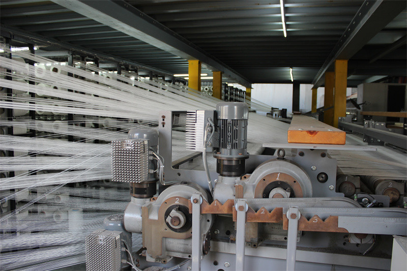 Foshan New Dream Carpet Co., Ltd. línea de producción de fábrica
