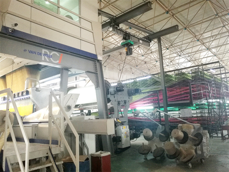 Foshan New Dream Carpet Co., Ltd. línea de producción de fábrica